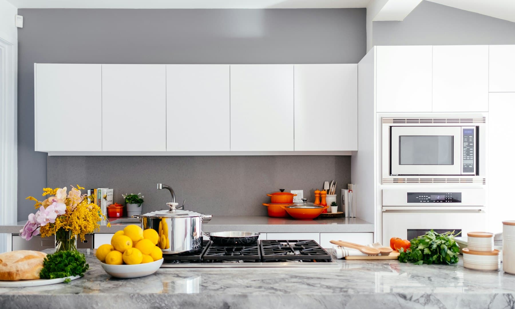 White kitchen interior with balanced natural light in a property listing photo